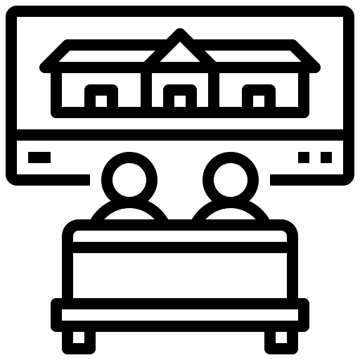 An icon that looks like two people watching TV together.
